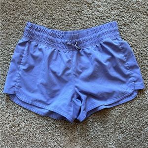 purple adidas running shorts in size M